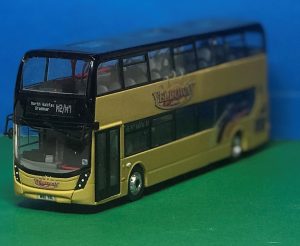Front and passenger side photo Yelloway Coaches Ltd Alexander Dennis 87 Seat Decker M90 YEL (was YX66 WLJ) Diecast Model in Yelloway cream with Yelloway Logo, livery flashes in gold, burgundy and orange. Route destination displays M2/M7 North Halifax Grammar produced by Paul Savage